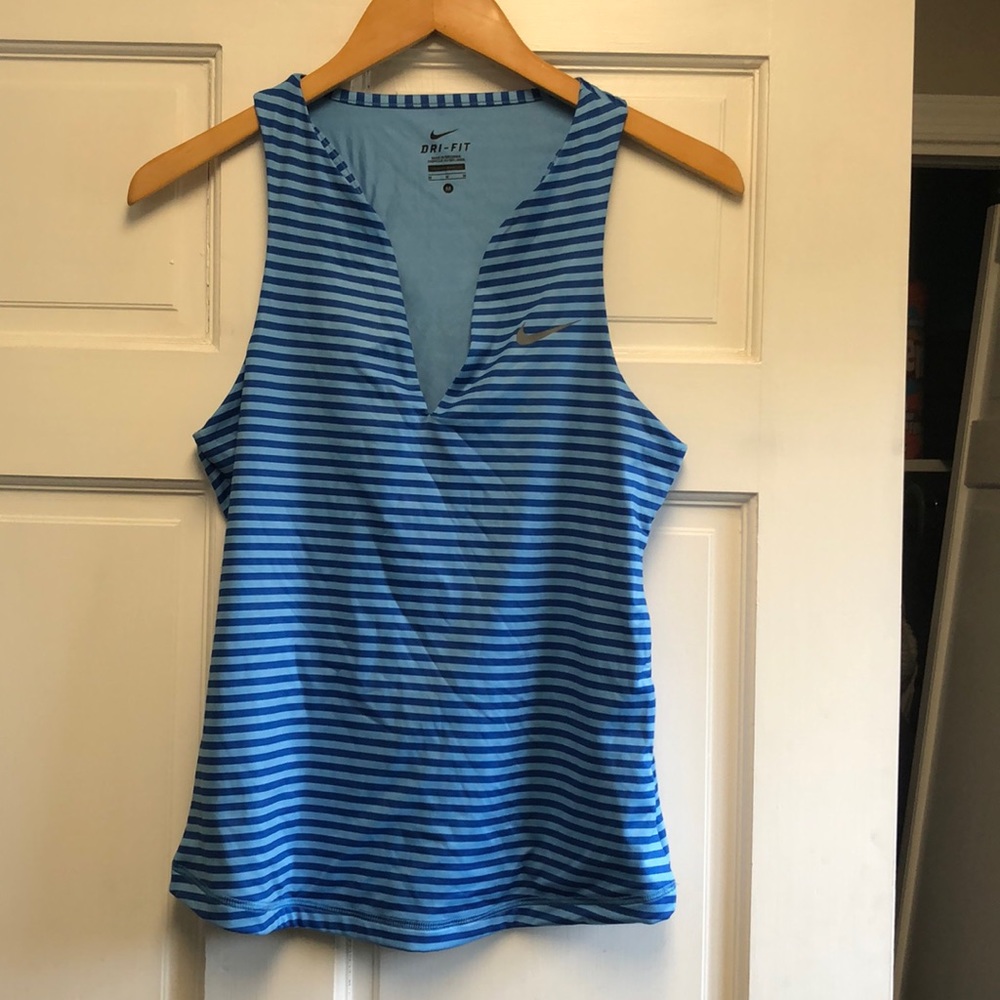 Blue striped Nike tennis top